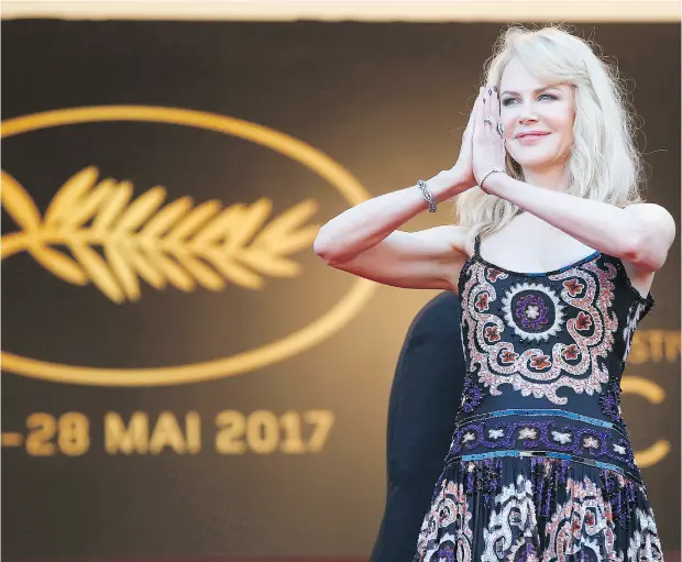  ?? ALASTAIR GRANT / THE ASSOCIATED PRESS ?? Nicole Kidman poses for photograph­ers upon arrival at the 70th anniversar­y ceremony of the Cannes Film Festival in France on Tuesday.