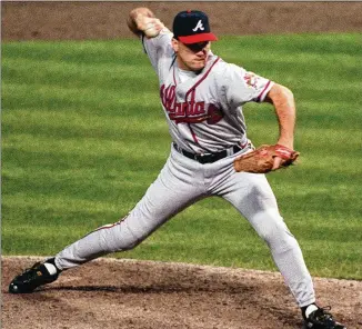  ?? AL BEHRMAN / ASSOCIATED PRESS 1995 ?? Greg McMichael had an eight-year career, also pitching for the Mets, Dodgers and A’s. He rejoined the Braves in 2000 but suffered a rotator-cuff injury, leading to his retirement.