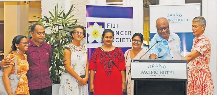  ?? Picture: FIJI GOVERNMENT. ?? Deputy Prime Minister Manoa Kamikamica second from right, with members of the Fiji Cancer Society, survivors and medical personnel, as well as staff members from the Health Ministry.