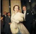  ?? ROBERT VIGLASKY — NETFLIX VIA AP ?? This image released by Netflix shows Claire Foy, center, and Matt Smith, right, in a scene from “The Crown.”