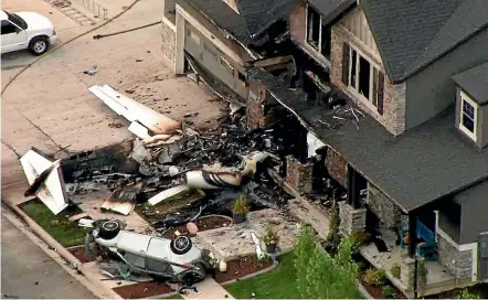  ?? AP ?? Duane Youd crashed a small plane into his house in Payson, Utah.