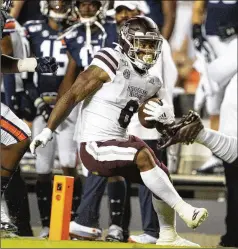  ?? MICHAEL CHANG / GETTY IMAGES ?? Mississipp­i State running back Kylin Hill didn’t find many holes to run through during the Bulldogs’ past two losses to Auburn and Tennessee. Hill totaled 58 yards on 28 carries in the two games.