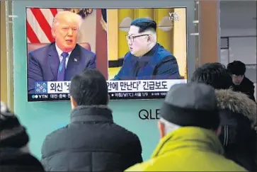  ?? Jung Yeon-je AFP/Getty Images ?? IN SEOUL, a TV news broadcast reports the agreed-to meeting between Kim Jong Un and President Trump.
