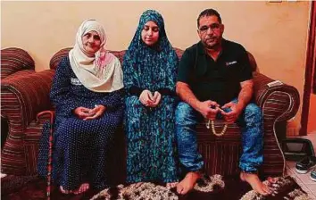  ?? Aghaddir Ali/Gulf News ?? Obaida’s father Ebrahim Sedqi with his wife and mother-in-law. Obaida’s grandmothe­r travelled from Jordan for the first time in her life to be present in court on the day of the verdict.