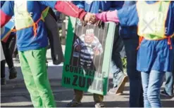  ??  ?? CAPE TOWN: Protesters against President Jacob Zuma, march to parliament yesterday. — AP