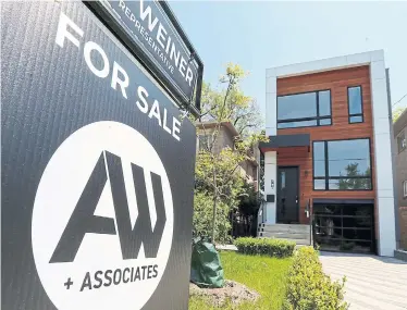  ?? ANDREW FRANCIS WALLACE TORONTO STAR ?? Resale home listings dropped 53.1 per cent annually in May, almost in lock-step with the 54 per cent reduction in sales last month, according to the Toronto Regional Real Estate Board.