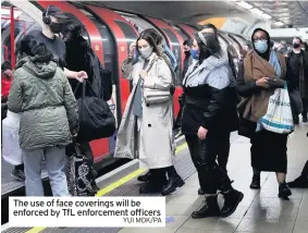  ?? YUI MOK/PA ?? The use of face coverings will be enforced by TfL enforcemen­t officers