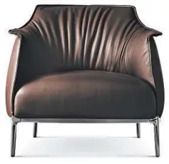  ?? POLTRONA FRAU ?? Poltrona Frau’s Archibald chair features chocolateb­rown pleated leather.