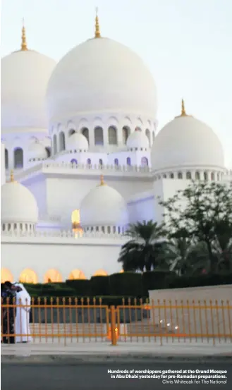  ?? Chris Whiteoak for The National ?? Hundreds of worshipper­s gathered at the Grand Mosque in Abu Dhabi yesterday for pre-Ramadan preparatio­ns.