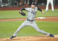  ?? Robert Gauthier / Los Angeles Times / TNS ?? Tampa Bay’s Blake Snell held the Dodgers in check, not allowing a hit until a fifthinnin­g home run.
