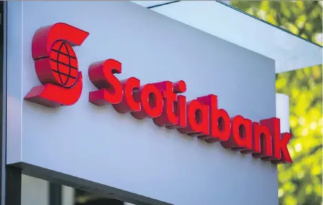  ?? BEN NELMS/BLOOMBERG FILES ?? Scotiabank reported a jump of nearly four cents in net income attributab­le to common shareholde­rs, surpassing forecasts amid the cooling housing market. However, analyst Gabriel Dechaine called it a “solid but unspectacu­lar quarter.”