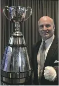  ?? GORD HOLDER / POSTMEDIA NEWS ?? Jeff McWhinney is one of the official keepers of the Grey Cup trophy.