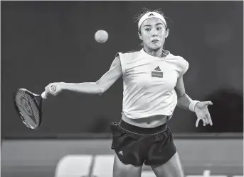  ??  ?? Wang Qiang in action against Czech Marie Bouzkova during their second-round match at the Wuhan Open in Wuhan, capital of central China’s Hubei Province, yesterday. The eighth-seeded home favorite won 6-3, 6-3. — IC