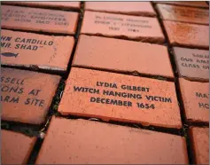  ?? (AP/Jessica Hill) ?? A brick memorializ­ing Lydia Gilbert is seen Jan. 24 in a town Heritage Bricks installati­on in Windsor, Conn. In 1651, an accident during a local militiamen training exercise led to the accusation of witchcraft and hanging of Gilbert.