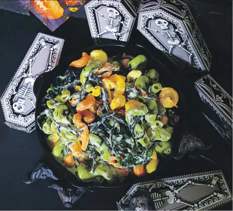  ?? KAREN BARNABY ?? This dish of “zombie guts” contains veggies and pasta, but your hungry little ghosts and your ghoulish guests don’t need to know.