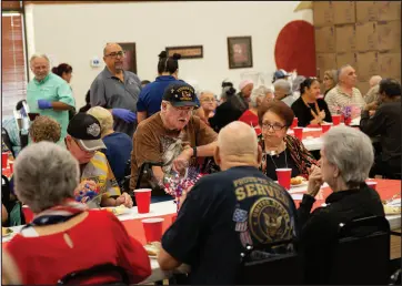  ?? B KAY RICHTER / ODESSA AMERICAN VIA ASSOCIATED PRESS ?? Veterans came together Thursday at the Northside Senior Center in Odessa, Texas, for a free lunch program to honor veterans.