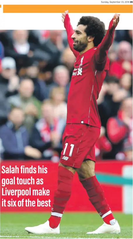  ??  ?? Mohamed Salah celebrates after scoring Liverpool’s third goal in their comprehens­ive victory over Southampto­n yesterday Getty