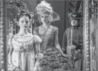  ?? LAURIE SPARHAM/DISNEY VIA AP ?? This image released by Disney shows Mackenzie Foy, left, and Keira Knightley in a scene from “The Nutcracker and the Four Realms.”