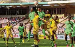  ?? Picture: Mohammed Chanjo/Gallo Images ?? Osinachi Ohale and Uchenna Kanu of Nigeria in an aerial battle against South Africa’s Refiloe Jane, Karabo Dhlamini and Noko Matlou during their Caf Women's Olympic qualifier, final round - 1st Leg match at MKO Abiola Stadium in Abuja, Nigeria on Friday.