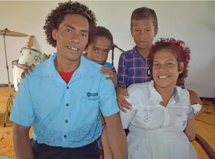  ?? Photo: Shratika Naidu ?? Samuela Seci (left) with his six-year-old son Esira Tabusava and Angeline Bradburgh and her 10-year-old son David Sagar at Holy Hand Church in Nakama, Labasa on December 19,2018.