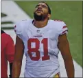  ?? BILL KOSTROUN — THE ASSOCIATED PRESS ?? 49ers tight end Jordan Reed grimaces as he is escorted off the field Sunday with another injury in a career of many.