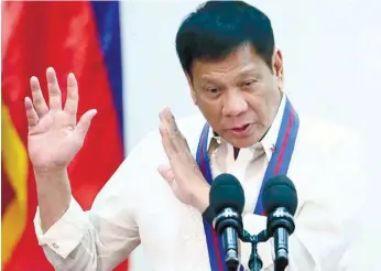  ?? (AP FOTO) ?? MORE NAMES. This July 1, 2016 file photo shows President Rodrigo R. Duterte during the “Assumption of Command” of new police chief, Director General Ronald dela Rosa at Camp Crame in Quezon City. Duterte announced in public that there are more than 150...