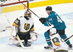  ?? Tony Avelar / Associated Press ?? Sharks forward Tomas Hertl celebrates after teammate Brent Burns’ overtime goal felled the Vegas Golden Knights and ended a seven-game losing streak.