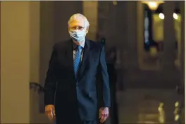  ?? MANUEL BALCE CENETA — THE ASSOCIATED PRESS FILE ?? Senate Majority Leader Sen. Mitch McConnell of Ky. walks towards the Senate floor on Capitol Hill in Washington.
