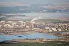  ?? RYAN JACKSON /Postmedia News ?? Europe’s proposed Fuel Quality Directive would impose higher carbon offsets and financial penalties against crude from oilsands bitumen.