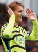  ?? ?? HITTING BACK AT THE CRITICS: Odegaard cups his fingers to his ears