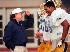  ?? Lake Fong/Post-Gazette ?? Coach John Majors talks to his players during the team practice on Nov. 26, 1996. Mr. Majors died Wednesday at age 85.