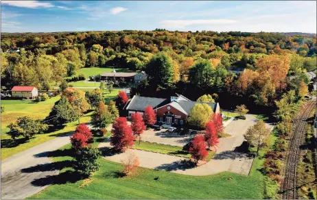  ?? Patrick Sikes / For Hearst Connecticu­t Media file photos ?? An aerial view of the fall foliage in New Milford on Oct. 15, 2020.