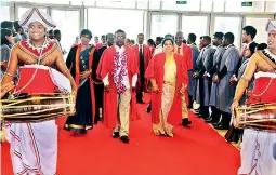  ??  ?? Awardees and Lecturers procession with the Chief Guest Hon Karunrathn­a Paranavith­a.