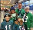  ??  ?? The Petersons get ready to board the train to Philly for the Eagles Parade.