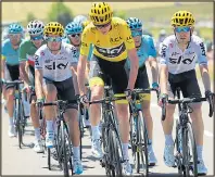  ??  ?? TOUGH ASK: Froome fights to keep the jersey
