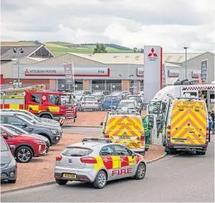  ??  ?? Fire and ambulance crews attended and police set up a cordon around the area. There were no reports of any injuries.