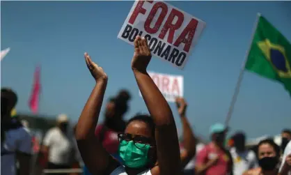  ?? Photograph: Pilar Olivares/Reuters ?? A protest against Bolsonaro on Copacabana beach. Objectors have intensifie­d their campaign against Bolsonaro, with plans for rallies in dozens of major cities.