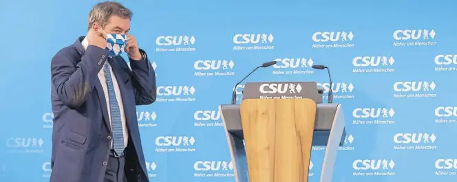  ?? DPA-BILD: KNEFFEL ?? Alles Blau-Weiß: CSU-Chef Markus Söder will Bayern die Treue halten – betont er zumindest auf dem Internetpa­rteitag.