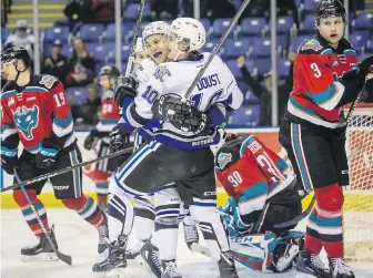  ?? DARREN STONE, TIMES COLONIST ?? Royals forward Logan Doust celebrates his goal against the Rockets with teammate Tanner Sideway during the first period at Save-on-Foods Memorial Centre.