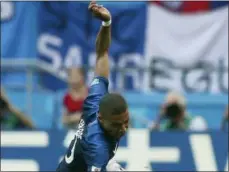  ?? THANASSIS STAVRAKIS — THE ASSOCIATED PRESS ?? France’s Kylian Mbappe runs with the ball during the round of 16 match between France and Argentina, at the 2018 soccer World Cup at the Kazan Arena in Kazan, Russia, Saturday.