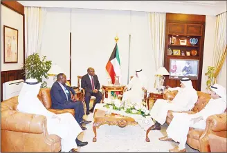  ?? KUNA photo ?? Kuwaiti Deputy Foreign Minister Khaled Suleiman Al-Jarallah met on Wednesday with a visiting Ghanaian delegation on bilateral relations and the current regional and internatio­nal situations. Al-Jarallah also received a visiting official delegation from...