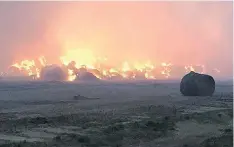  ?? PHOTOS: OUTLOOK FIRE DEPT./TWITTER ?? More than 1,000 hay bales were destroyed at Elcan Forage during a fire that began Friday afternoon.