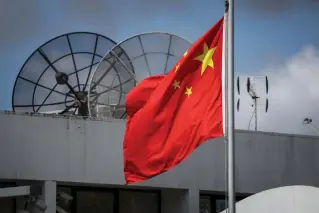  ?? NEW ZEALAND HERALD PHOTO VIA AP ?? SEEING RED
China’s flag flutters in the wind at its consulate in the city of Auckland, northern New Zealand, on Tuesday, March 26, 2024.