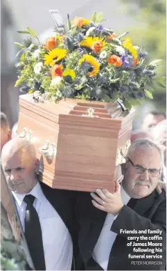 ??  ?? Friends and family carry the coffin of James Moore
following his funeral service MOURNERS in Co Antrim have given thanks for the life of a 49-yearold Templepatr­ick man killed in a tractor accident.
James Moore’s brother found him under a tractor at...