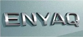  ??  ?? TAGGED Skoda announced the Enyaq name by revealing the car’s tailgate badge (above). New EV will be a crossover similar in design to the Vision iV concept seen at Geneva last year