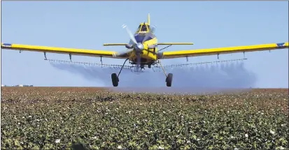  ?? GARY KAZANJIAN — THE ASSOCIATED PRESS FILE ?? California regulators have announced a new rule that bans farmers from using certain pesticides near schools and day care centers. The state’s Department of Pesticide Regulation announced the new rule Tuesday. The department says the new regulation is...