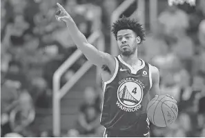  ??  ?? With Stephen Curry’s status for the first round uncertain, the Warriors signed Quinn Cook, above, to a guaranteed contract. ORLANDO RAMIREZ/USA TODAY SPORTS