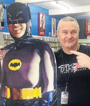  ?? PHOTO: SUPPLIED ?? Credits rolling . . . Former Valley Video manager Glen Edmondson poses with Batman.