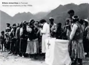  ??  ?? Ethnic minorities in Yunnan receive vaccinatio­ns in the 1950s