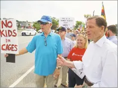  ?? Hearst Connecticu­t Media file photo ?? Performer James Naughon, left, a Weston resident, and U.S. Sen. Richard Blumenthal, take part in a protest on June 29 in Westport against U.S. border detention centers.